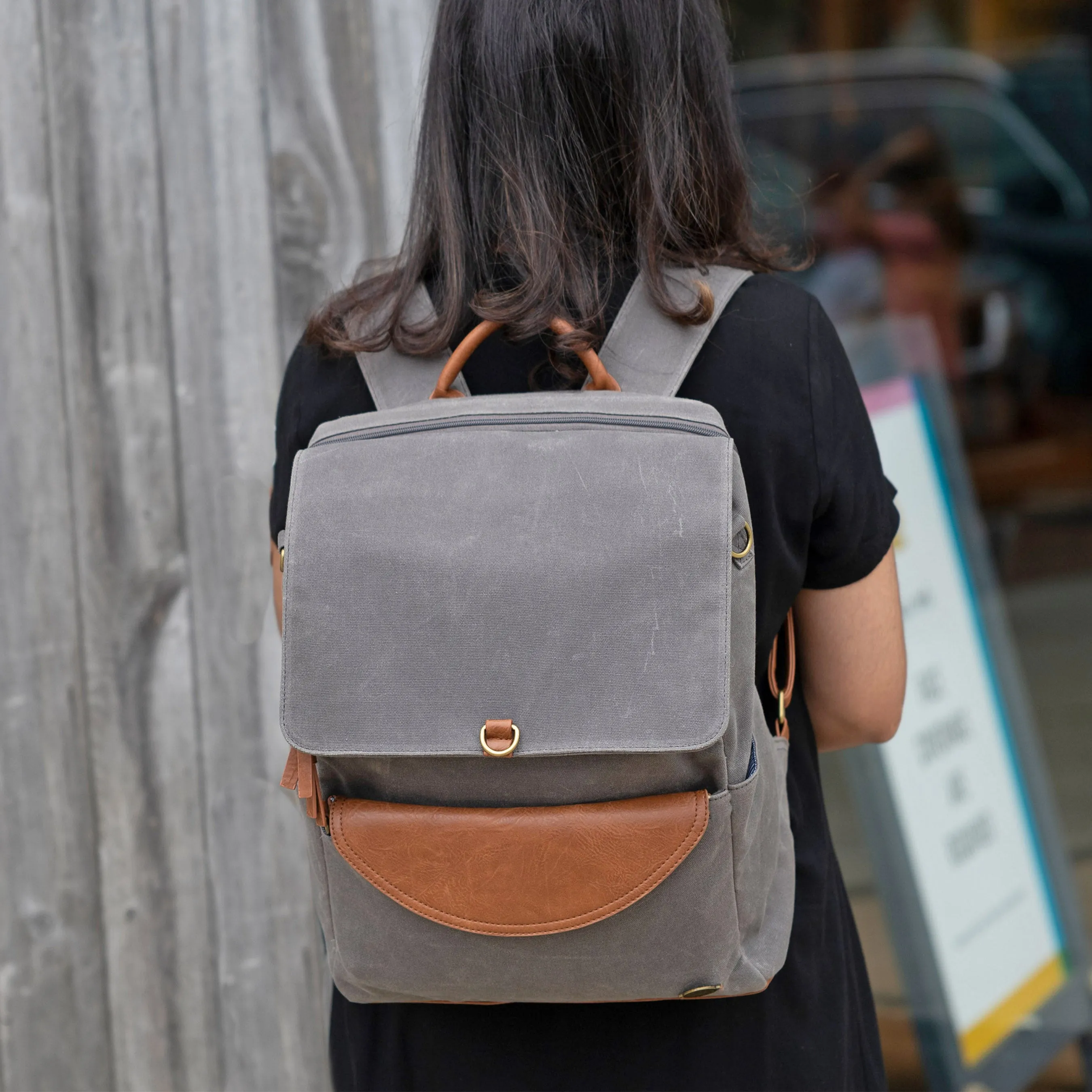 Grey Canvas Backpack: Stylish Versatility with Laptop Compartment
